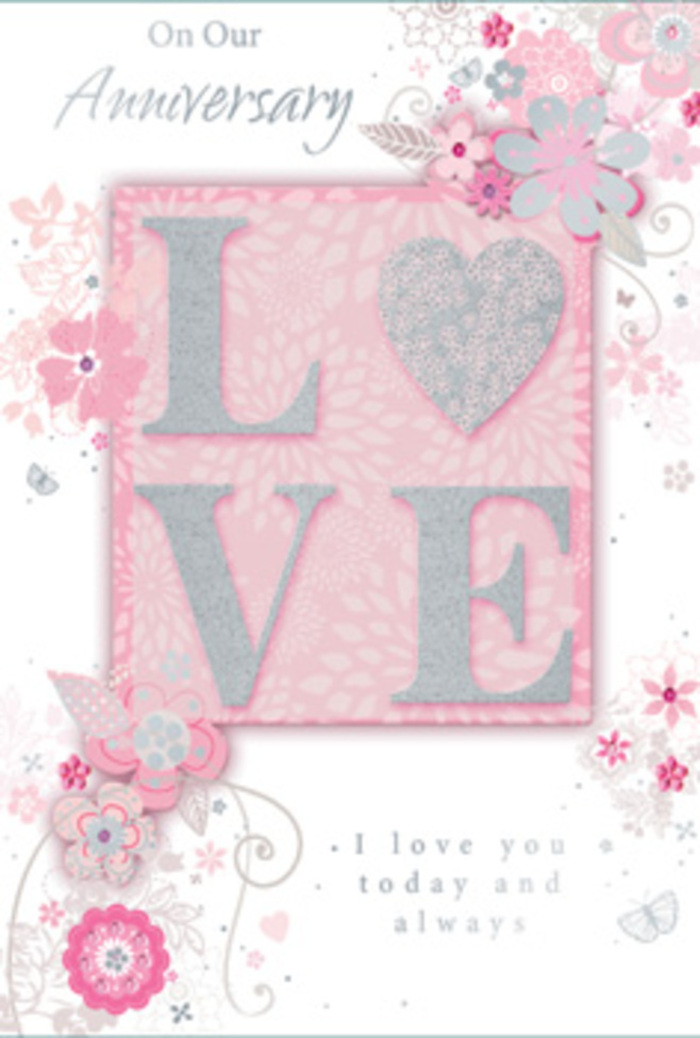 The anniversary card in this scene unfolds with the gentle warmth of a cherished ritual, its design awash in soft pinks, lilacs, and creamy whites reminiscent of the romantic colour combinations often arranged for Norbiton couples. Dominating the centre is the word LOVE, printed in bold, raised lettering coated with a frosted glitter finish that sparkles softly, like sunlight catching the surface of a crystal vase on a dining table. The tactile quality of the letters suggests a pleasing contrast against the smoother paper around them, encouraging touch as much as sight. Along the top and sides, wispy hand-drawn blooms and delicate sprays drift in from the edges, framing the central message without enclosing it. These flowers, illustrated in gentle shades of blush, lilac, and ivory, are stylized yet evocative of garden roses and small, airy blossoms that might be found in bouquets destined for homes near Norbiton's leafy side streets and local parks. Slender stems curl into filigree lines, while tiny leaves and subtle butterflies appear almost hidden among the petals, like little discoveries in a well-crafted floral arrangement. The background is a soft, powdery pink that grows paler toward the edges, adding a sense of depth and a feeling of light flooding in from above. Near the lower half of the card, the words I love you today and always are printed in a graceful, understated typeface, leaving generous space around the text so it feels calm and contemplative rather than crowded. The entire composition has the effect of a hand-tied bouquet translated into paper art: quietly fragrant in mood, thoughtful, and designed to honor love that has grown deeper over time, much like the relationships celebrated with anniversary flowers in Norbiton.