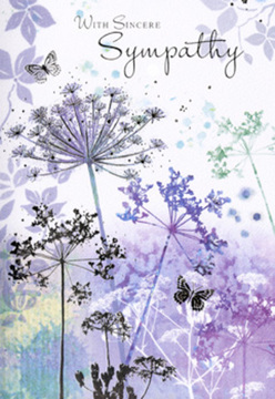 The illustration inside this sympathy card is a tender, contemplative study of wildflowers and light, reminiscent of a peaceful walk from Norbiton towards the open stretches of Richmond Park. Tall, willowy stems rise in elegant arcs, their fine lines tapering delicately as they reach upward. At the top of each stem, umbelliferous flower heads bloom in intricate, lace-like clusters, painted in subdued shades of violet, soft blue, and misty lavender. These tones drift into one another through transparent layers of watercolour, producing a soft focus effect that feels both dreamy and grounded. The background is a muted haze of purples and silvery blues, blurred like distant trees at dusk, offering a sense of depth without pulling attention from the foreground blooms. Scattered butterfly silhouettes hover among the stems, their wings almost weightless and partially see-through, as if they are simply resting on the air. Their presence suggests a continuation of the spirit, something many families in Norbiton look for when choosing symbolic touches for their funeral flowers. Light seems to fall gently across the entire scene, without strong shadows, creating a feeling of calm reflection, akin to standing in a quiet garden just after rain. The overall mood is one of compassionate stillness: no crowded detail, no bold contrast, just subtle colour and thoughtful composition. Crafted with the same sensitivity we bring to condolence bouquets delivered around Norbiton and Kingston, this card offers more than simple decoration. It provides a quiet visual companion to sympathy flowers, helping convey heartfelt support to someone walking through grief.