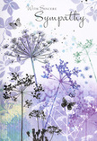This sympathy card portrays a gentle floral scene that seems to draw its calm from the green spaces around Norbiton, from tucked-away gardens to the edges of nearby Richmond Park. A cluster of tall, slim stems rises from the lower part of the design, each one reaching upward with relaxed poise. At the tip of every stem, an umbelliferous flower head unfurls in tiny, clustered florets, depicted with fine, almost sketch-like touches of lavender, indigo, and soft blue. These colours are laid down in transparent watercolour layers, allowing hints of white paper to glow through and giving the blooms a light, breathy quality. Behind them, the background dissolves into a dreamy wash of muted purple and cool blue-grey, like distant trees and sky blurred by an early morning mist. Across this soft field of colour, faint suggestions of additional stems and foliage drift in and out of focus, adding depth without stealing the spotlight. A few butterflies float between the flowers, their delicate wings barely defined, appearing more as gentle impressions of movement than solid shapes. They introduce a note of quiet reassurance, echoing the way a single butterfly might alight on a sympathy wreath at a Norbiton memorial service. The overall light is diffuse and forgiving, with no sharp highlights or deep shadows, creating an atmosphere of contemplation and ease. This is the kind of card that compliments a carefully arranged condolence bouquet - thoughtful, understated, and full of quiet emotion - offering a visual expression of sympathy that supports, rather than overwhelms, someone facing the loss of a loved one in the Norbiton community.